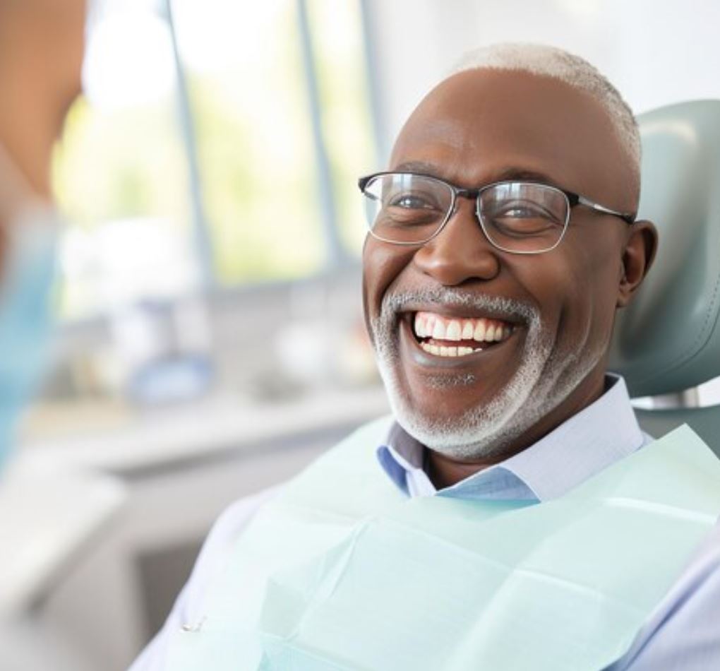 Gentleman smiling during a dental visit
